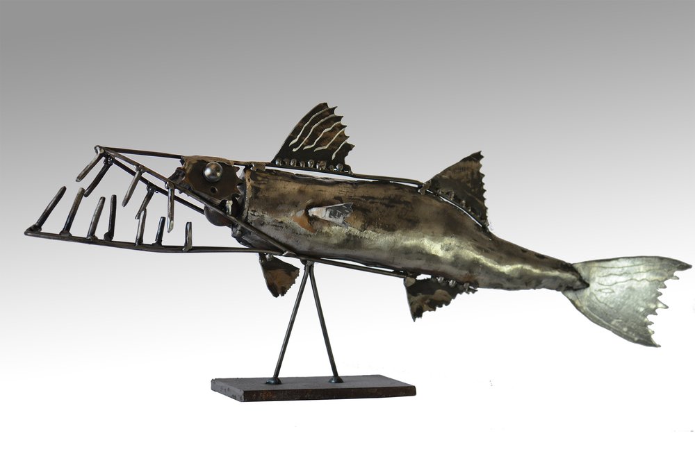 ORKINOSLAR DEMIRDEN HEYKELE DONUSTU