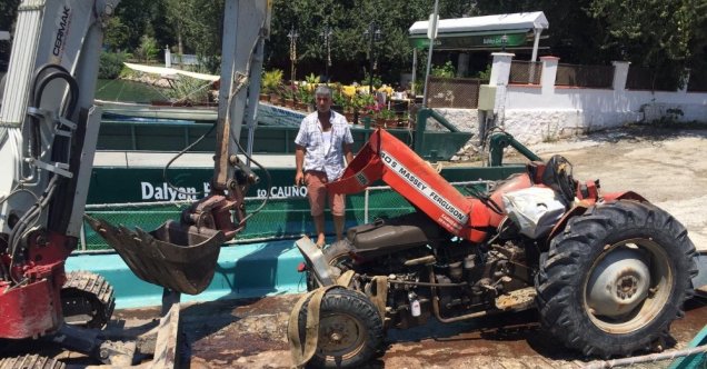 Göle devrilen traktörü DALKO kurtardı