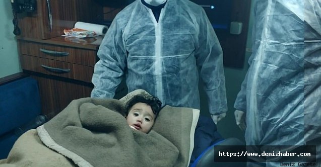 1 yaşındaki göçmen bebek denizin içinde donmak üzereyken kurtarıldı!